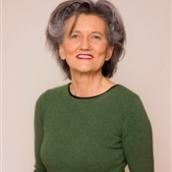 a woman smiling for the camera