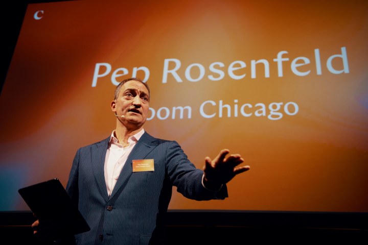 Pep Rosenfeld holding a sign