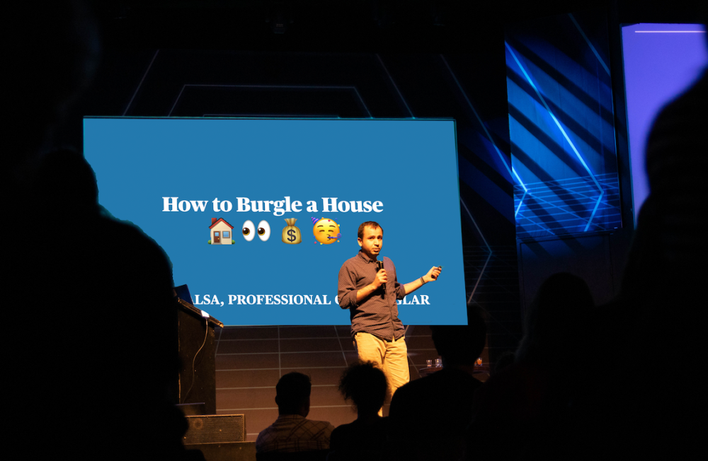 a person presenting a power point on stage