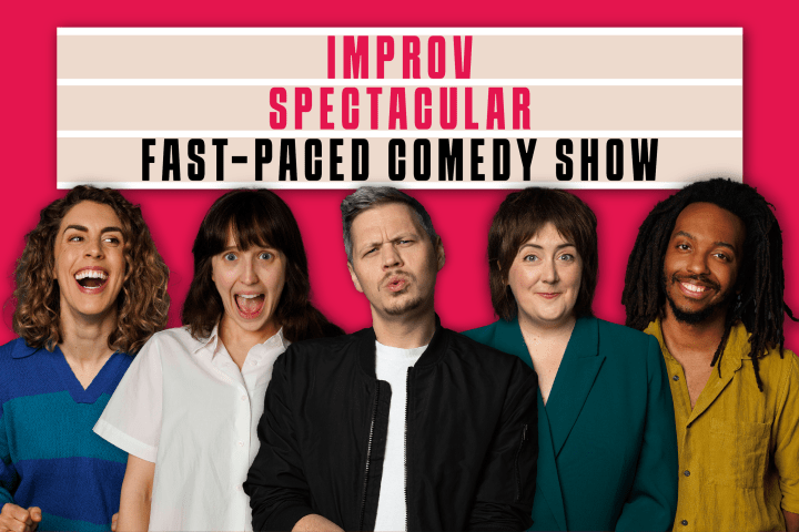 Five Boom Chicago cast members smiling under a sign that reads 'Improv Spectacular Fast-Paced Comedy Show'.