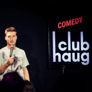 a man holding a sign