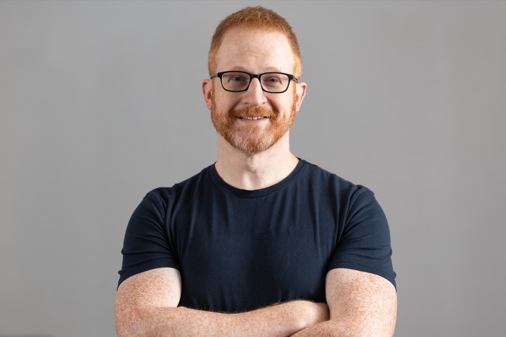 Steve Hofstetter wearing glasses posing for the camera