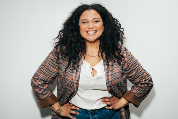 Michelle Buteau smiling for the camera