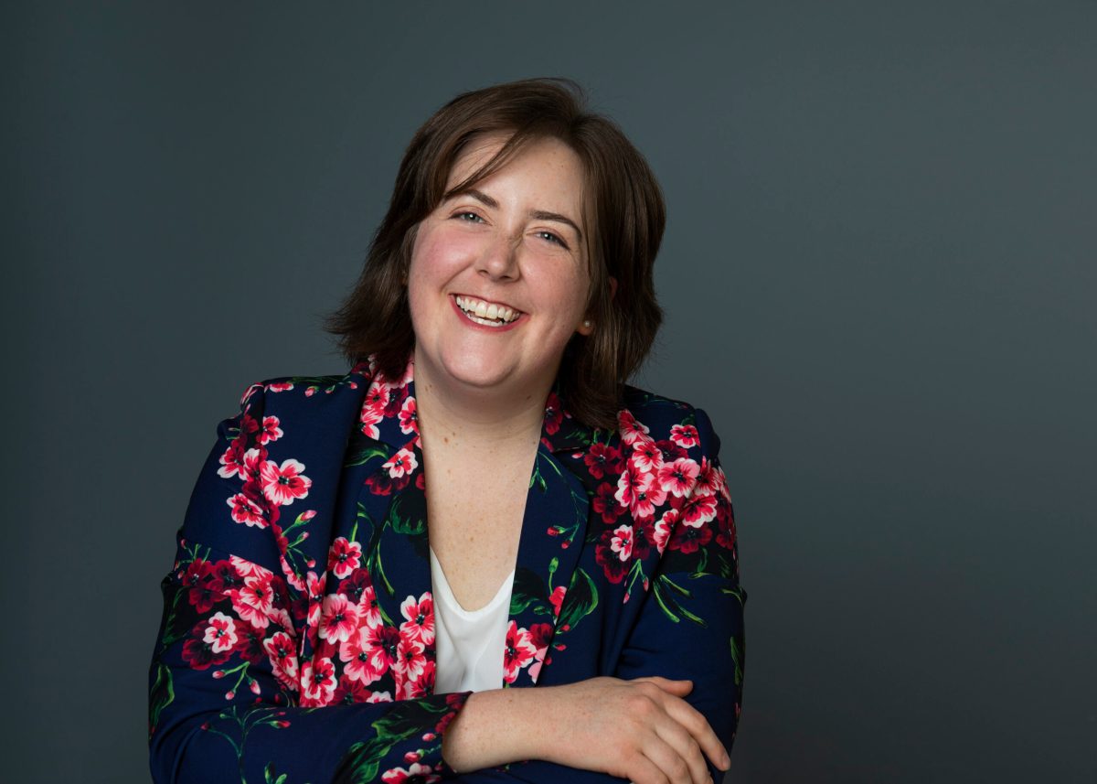 a person wearing a purple shirt