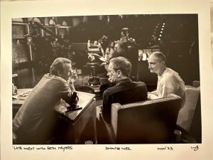 a group of people sitting at a table