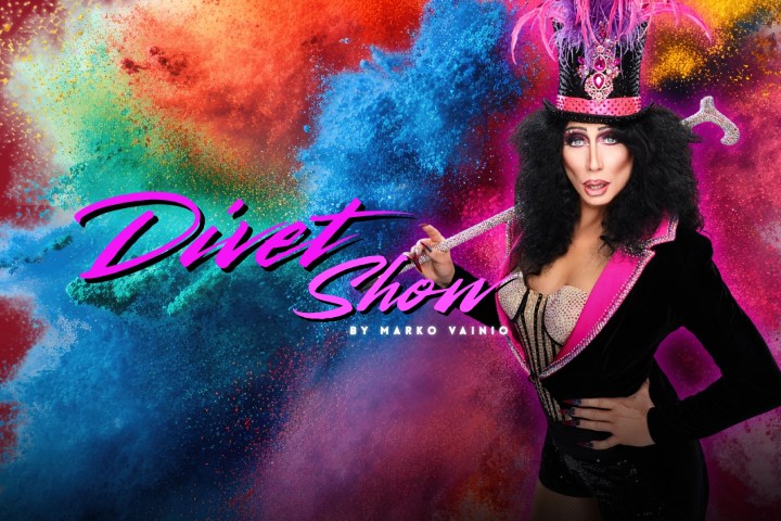 Person in colorful costume and hat with 'Divet Show' text over vibrant powder explosion.