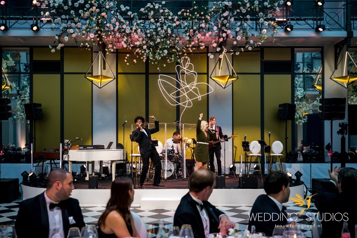 a group of people sitting at a table in a restaurant