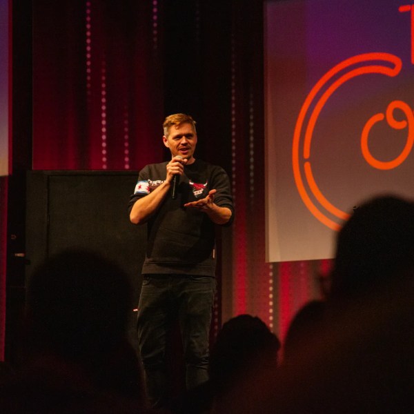 Matt Castellvi standing on stage