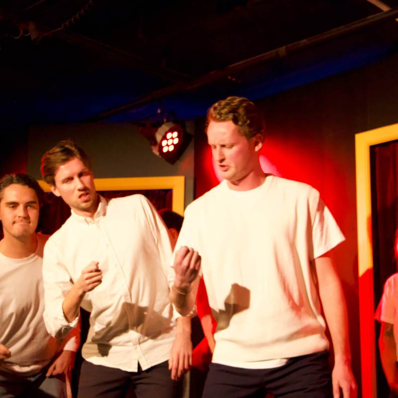 a group of people posing for the camera