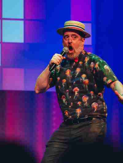 a person standing on a stage