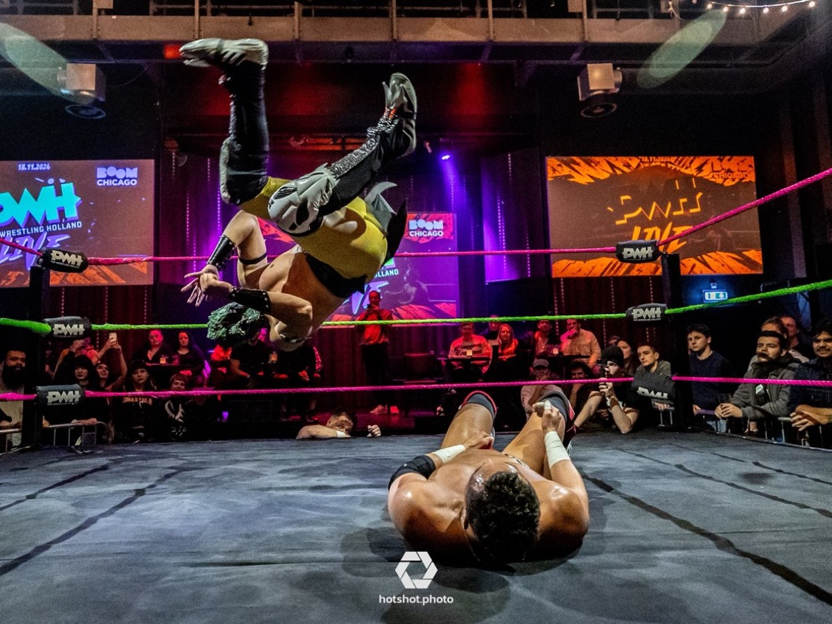 a man doing a trick on a stage