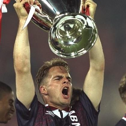 a group of people around each other