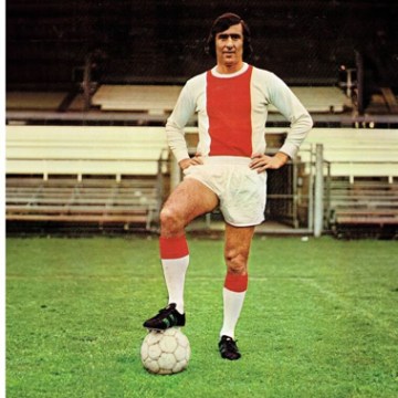 a man with a football ball on a field