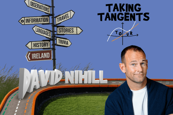 Man beside signpost with words; 'Taking Tangents Tour' and 'David Nihill' on curved road.