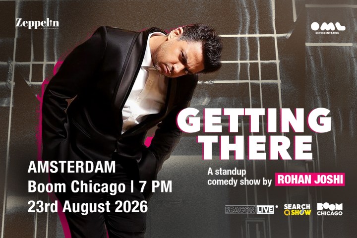 Man in suit leaning with text promoting standup show 'Getting There' by Rohan Joshi in Amsterdam, August 2026.