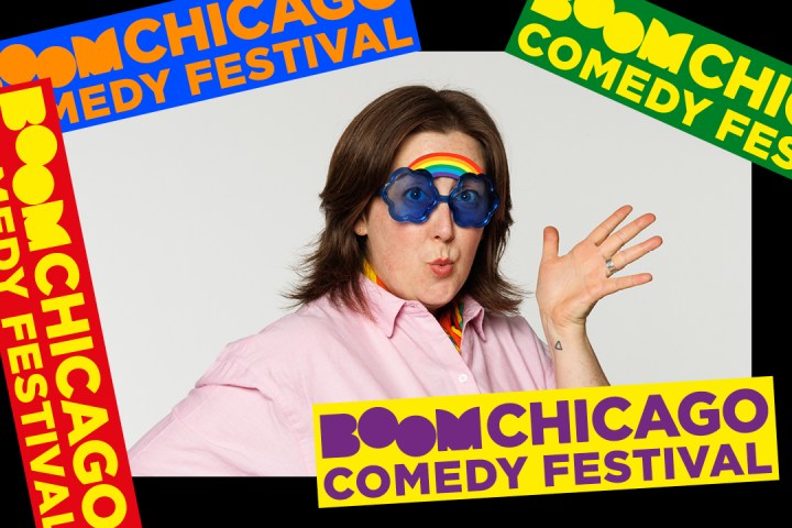 Person posing with goggles, surrounded by 'Boom Chicago Comedy Festival' banners.
