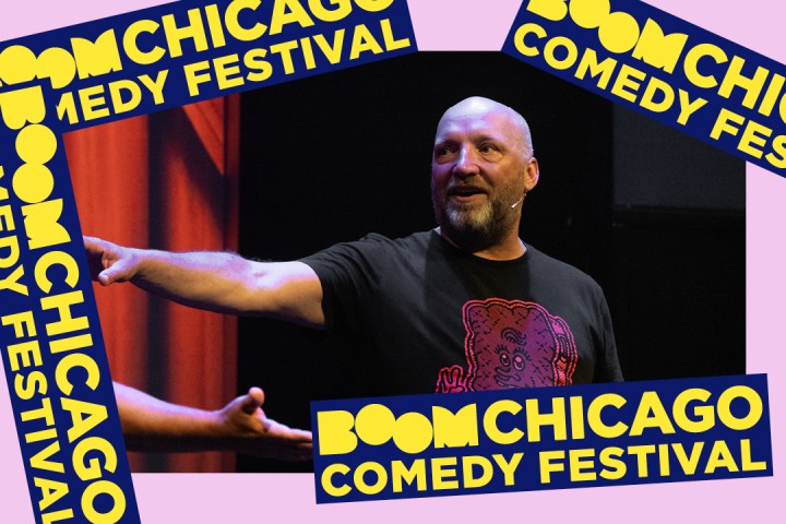 Man on stage at Boom Chicago Comedy Festival with graphic border.